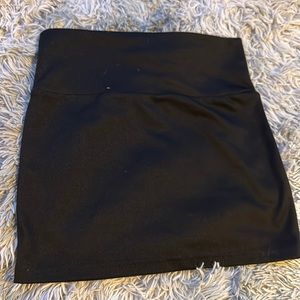 Black mini skirt I never wore it, it just sat around.